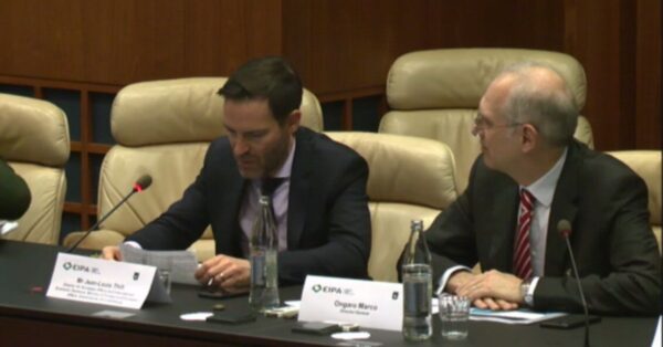 two men conference with microphone