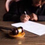 documents signed law hammer paper